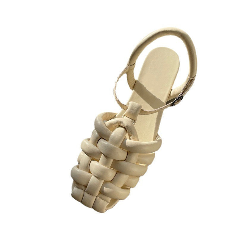 Sandales Plates Tressées en Cuir d’Agneau – Élégance Naturelle